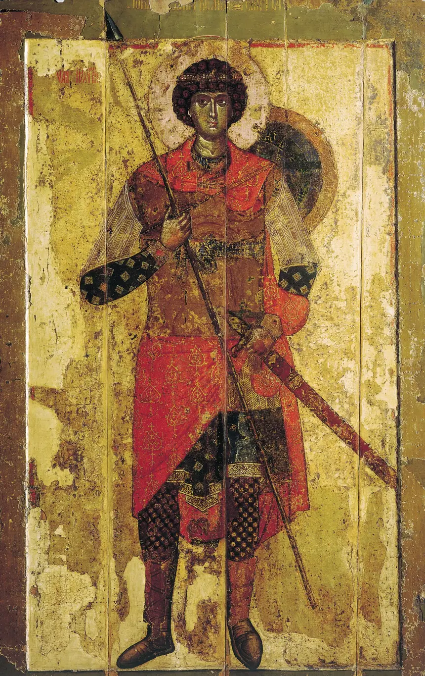 Thánh George đứng, tay cầm giáo và gươm, icon chính của tu viện Thánh George (Yuriev) ở Novgorod. Wikipedia ghi tấm icon này vẽ khoảng năm 1130.