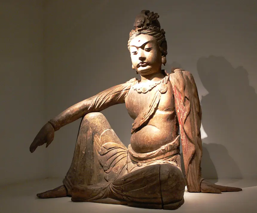 Quan Âm ngồi thế thư thái, gỗ, Trung Quốc, thời Tống, thế kỷ 12. Bảo tàng Dân tộc học Berlin.